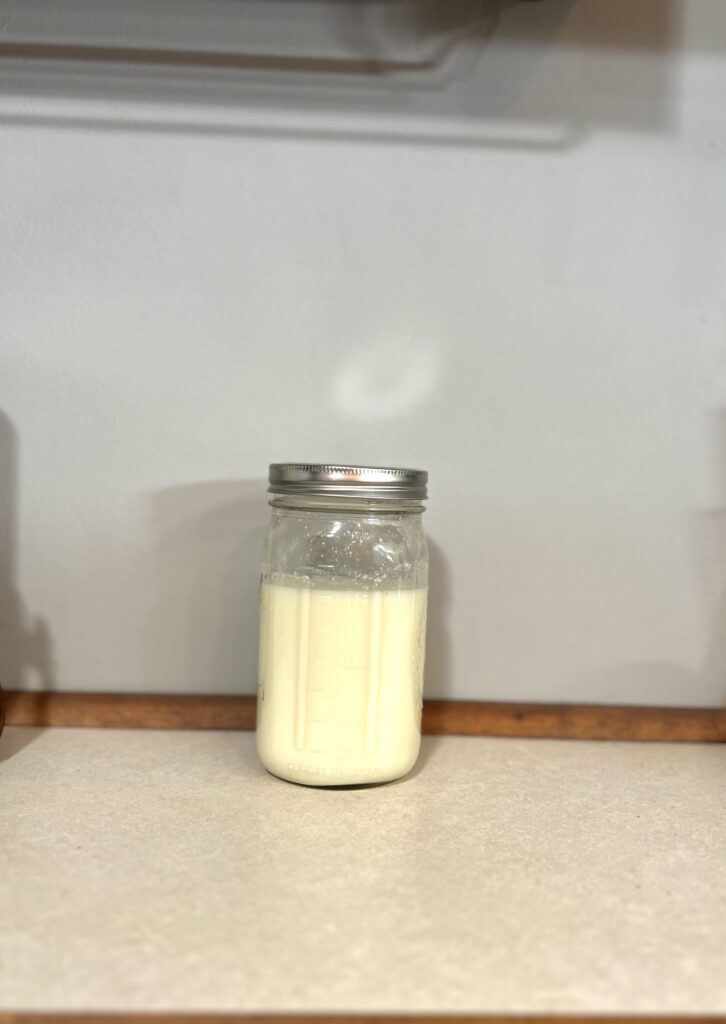 Buttermilk in a mason jar sitting on the counter  