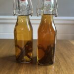 homemade vanilla extract in glass bottles